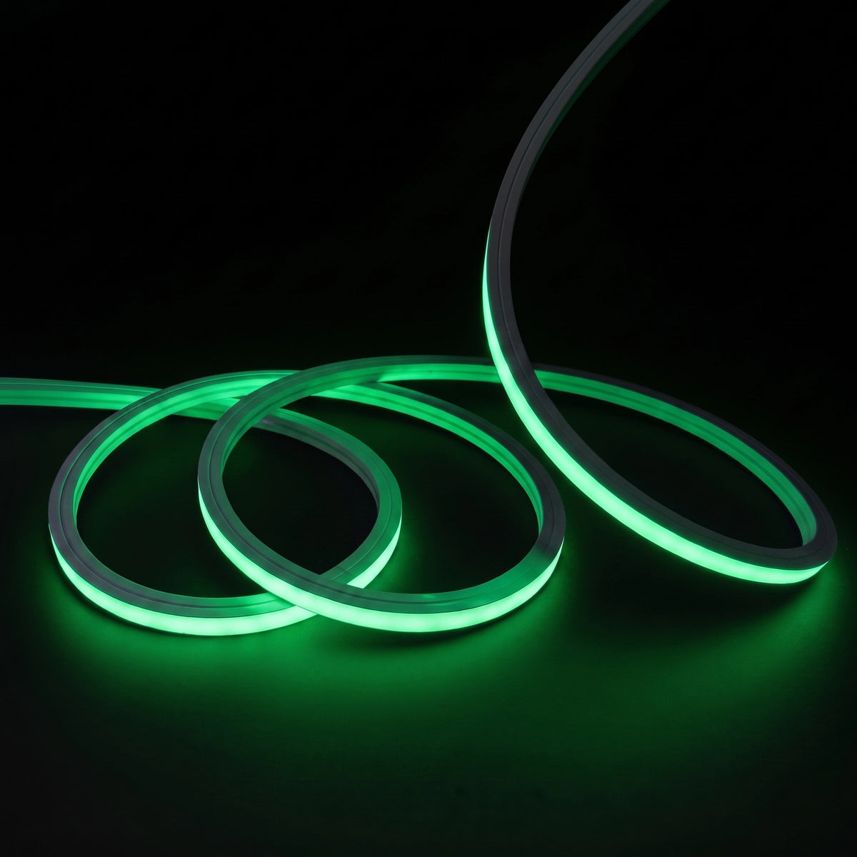 Green LED Neon Flex 15x15mm Top Bend, overlapping offset coils with raised arc and colour glow on a black surface