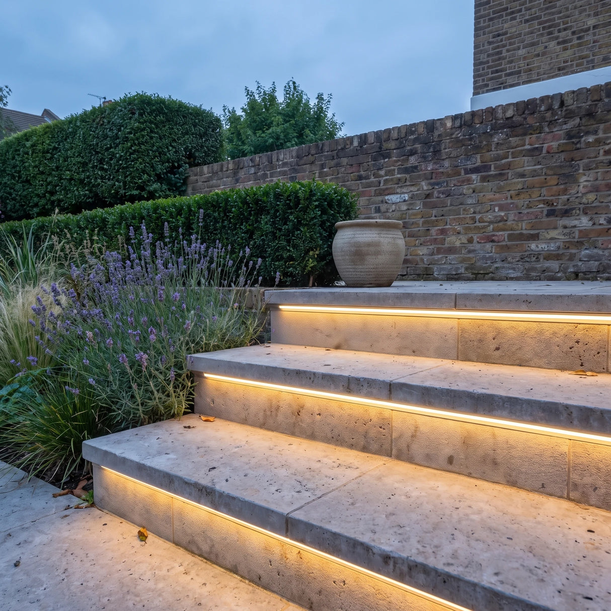 Warm White 2700K 15x15mm Top Bend LED neon flex - outdoor garden-step installation illustration.