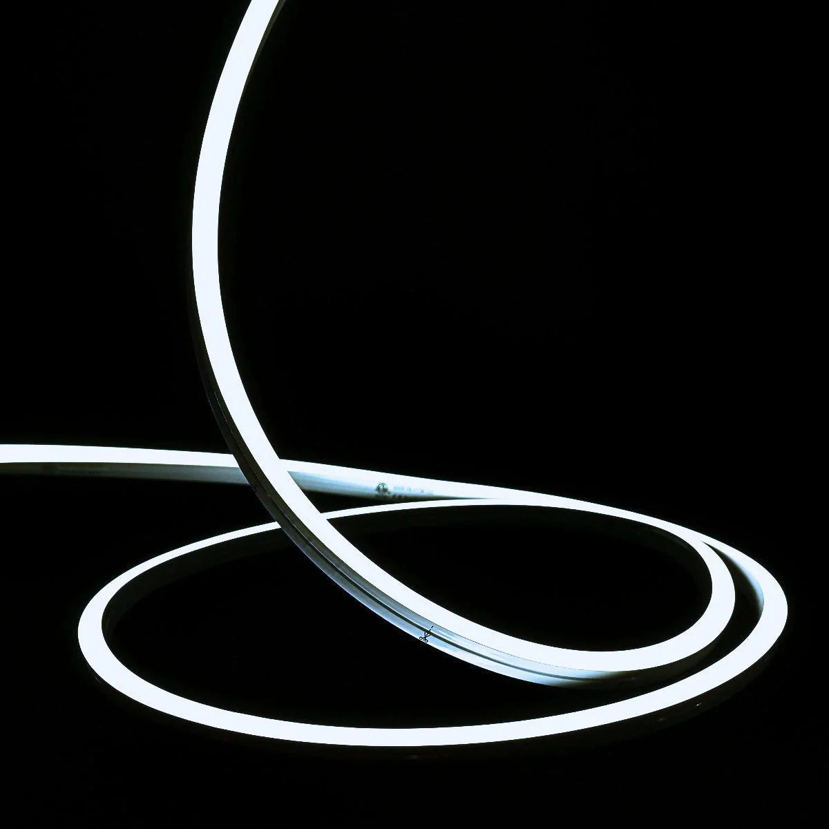 ATOM LED cool white 6000K 10x10mm side bend neon flex turning a 90° corner around an outdoor garden patio — 48V IP67 waterproof