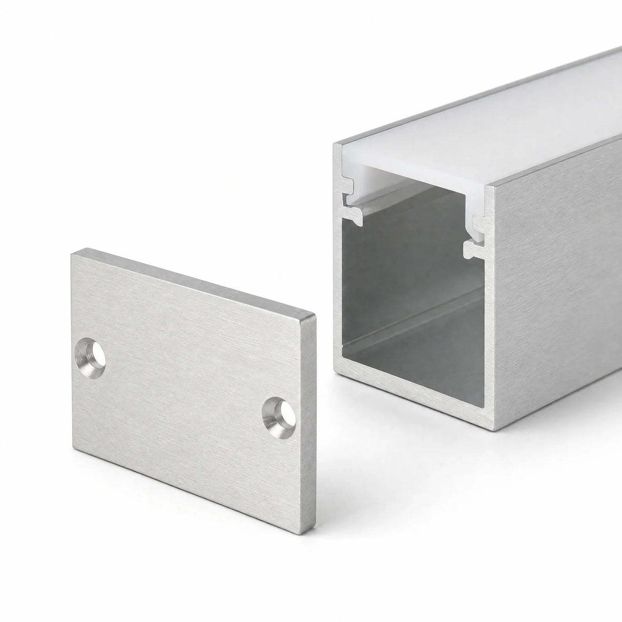 Brushed aluminium end cap with countersunk screw holes and 32.2 x 20mm profile