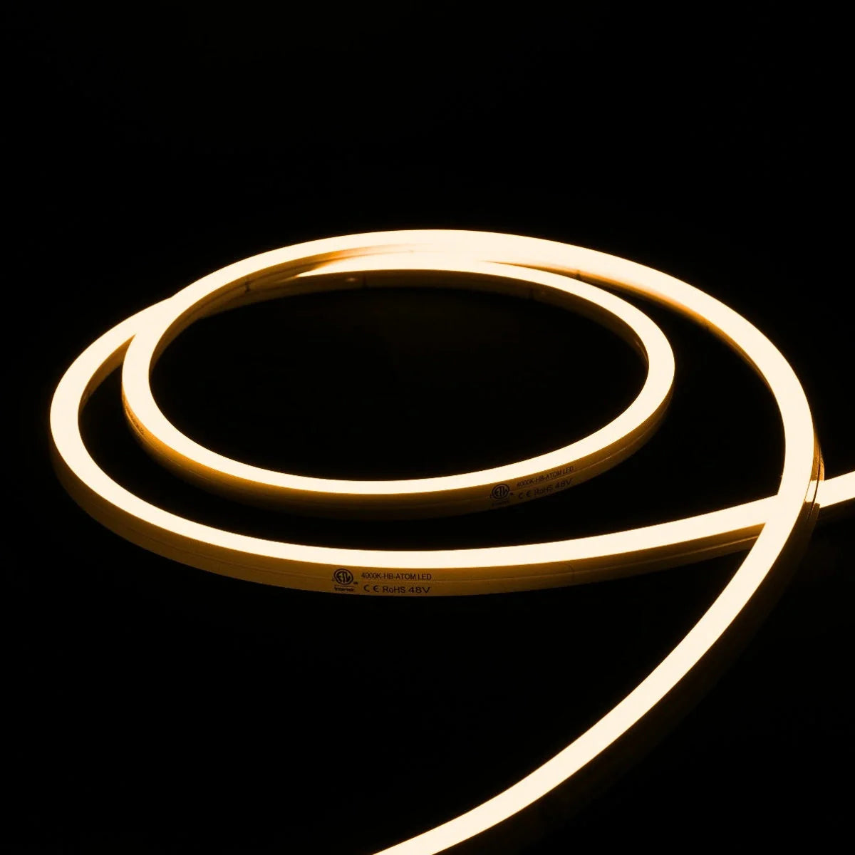 ATOM LED warm white 2700K 10x10mm side bend neon flex outlining a pergola frame outdoors — 48V IP67 waterproof