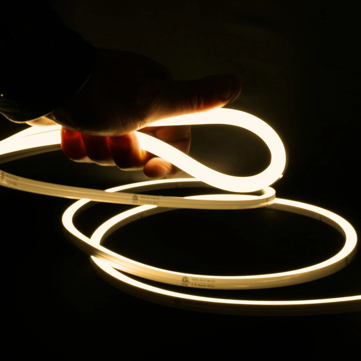 ATOM LED warm white 3000K 10x10mm side bend neon flex lighting a garden perimeter at night — 48V IP67 waterproof