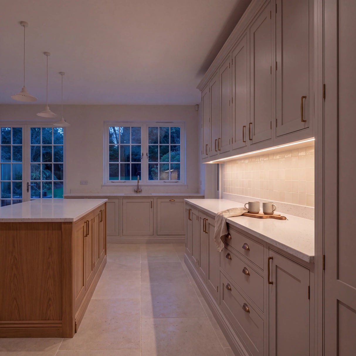 Warm White 3000K Free Cut COB LED strip lighting beneath wall cabinets in a large British kitchen in the evening; installation illustration.