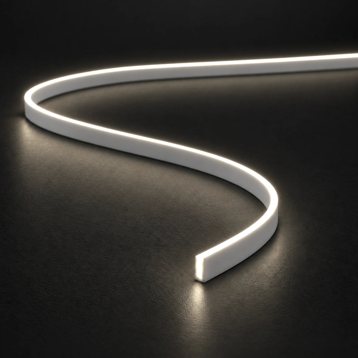 UK LED Lights FreeCut Mini Neon Flex 4x10mm 4000K natural white illuminated S-shaped strip on charcoal surface