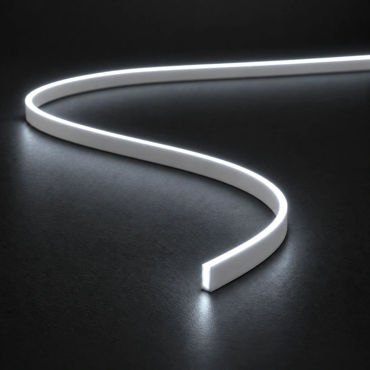 UK LED Lights FreeCut Mini Neon Flex 4x10mm 6000K cool white illuminated S-shaped strip on charcoal surface