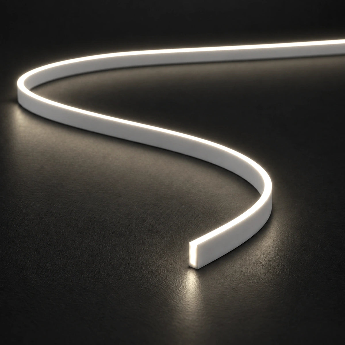 UK LED Lights FreeCut Mini Neon Flex 4x8mm 4000K natural white illuminated S-shaped strip on charcoal surface
