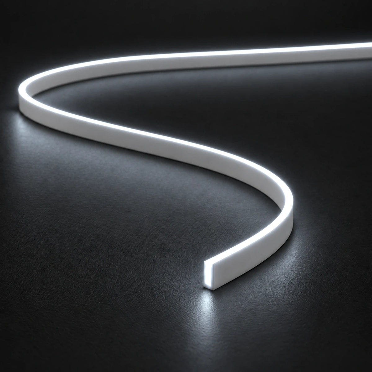 UK LED Lights FreeCut Mini Neon Flex 4x8mm 6000K cool white illuminated S-shaped strip on charcoal surface