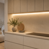 Warm white 3000K COB LED strip fitted beneath contemporary kitchen cabinets