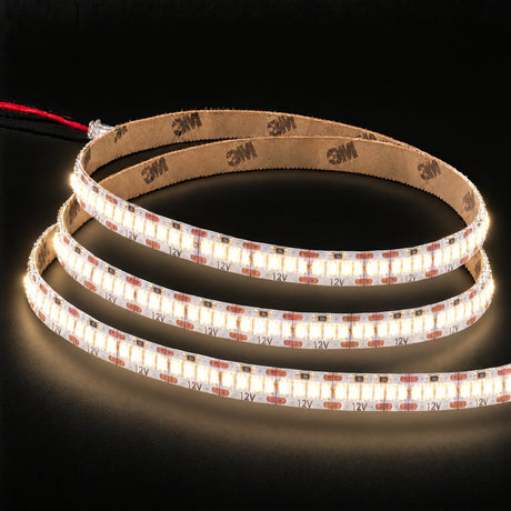 3000K 12V 240 LEDs/m LED strip with 3M backing on charcoal background