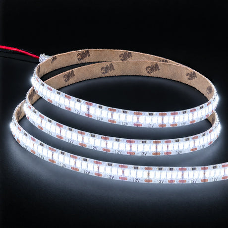 6000K 12V 240 LEDs/m LED strip with 3M backing on charcoal background