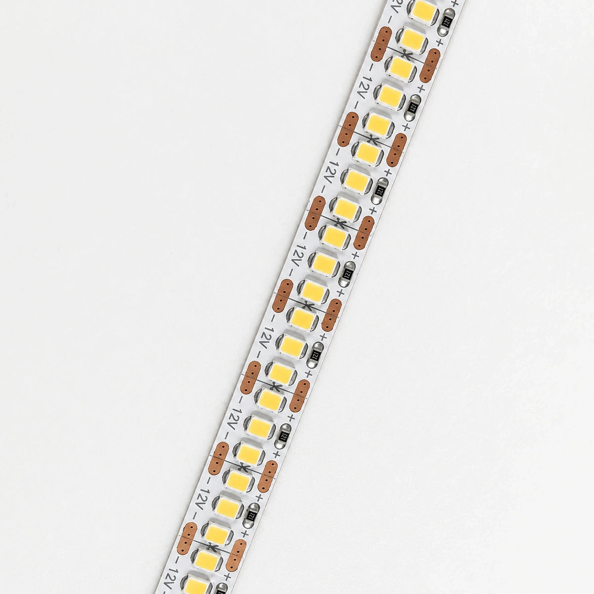 12V 240 LEDs per metre strip close-up showing three LEDs between cut points