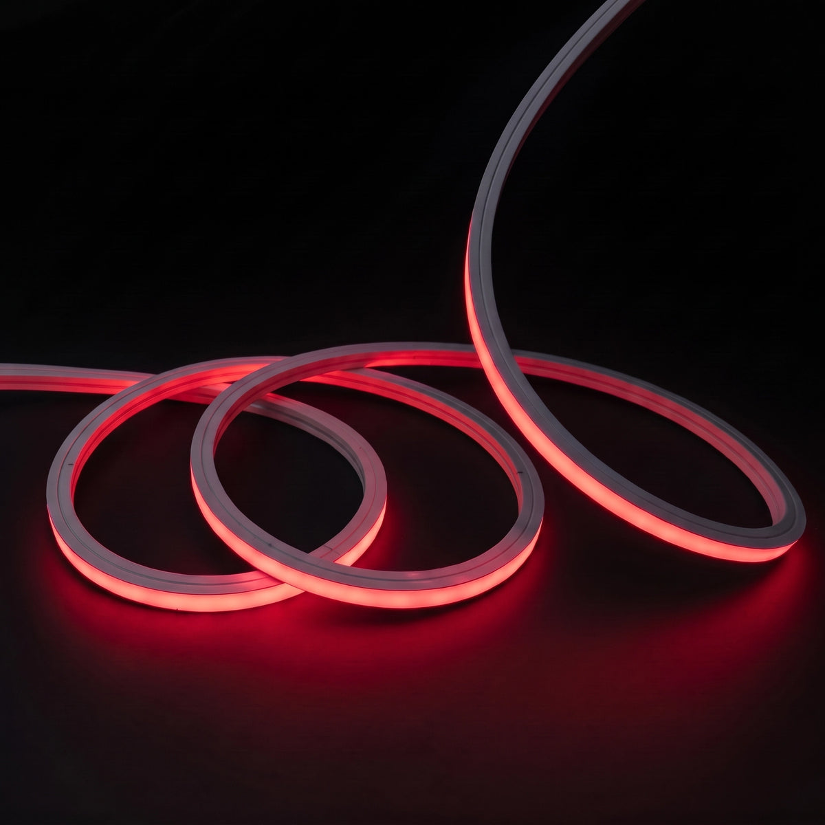 Red LED Neon Flex 15x15mm Top Bend, overlapping offset coils with raised arc and colour glow on a black surface
