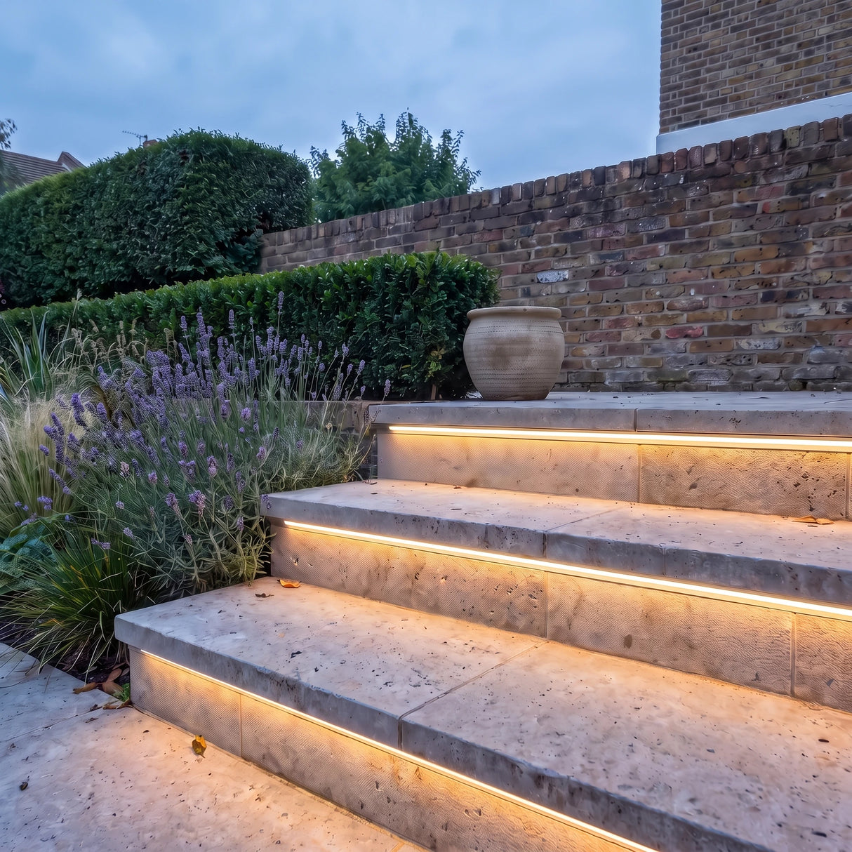 Warm White 3000K 15x15mm Top Bend LED neon flex - outdoor garden-step installation illustration.