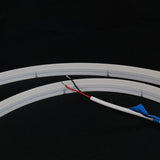 ATOM LED cool white 6000K 10x10mm side bend neon flex forming a square 90° corner along a garden path — 48V IP67 waterproof
