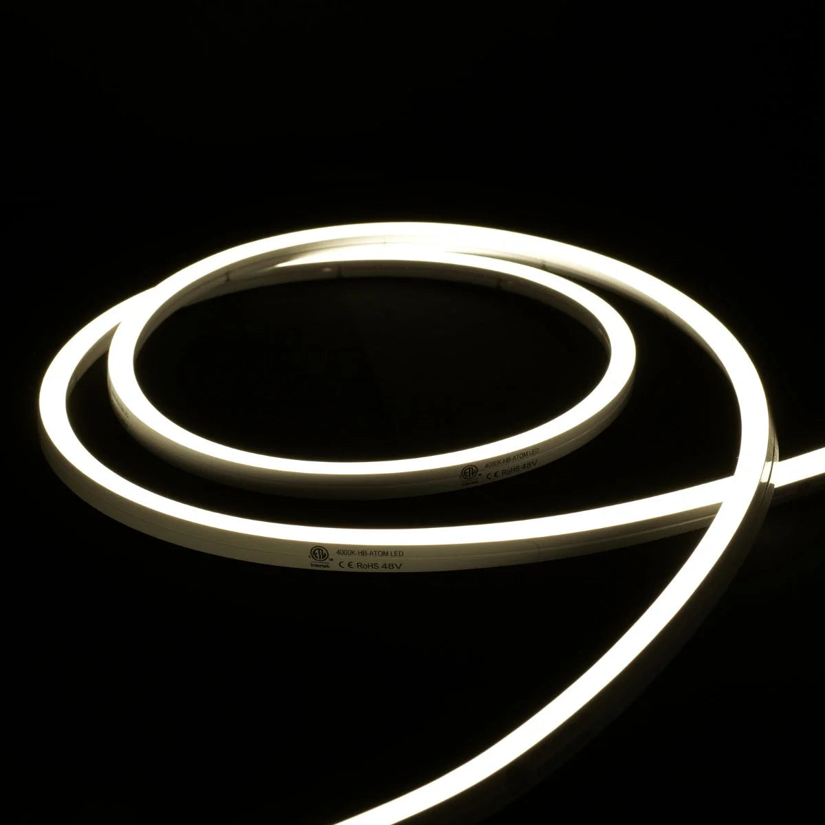 ATOM LED natural white 4000K 10x10mm side bend neon flex bending flat around an outdoor flower border — 48V IP67 waterproof