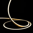 ATOM LED warm white 3000K 10x10mm side bend neon flex turning a 90° corner around an outdoor garden patio — 48V IP67 waterproof