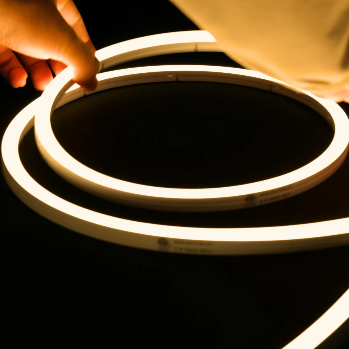 ATOM LED warm white 3000K 10x10mm side bend neon flex fitted flat along timber decking — 48V IP67 waterproof