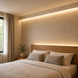 Illustrative 2700K FreeCut COB LED strip bedroom installation with continuous concealed lighting