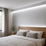 Illustrative 5000K FreeCut COB LED strip bedroom installation with continuous concealed lighting