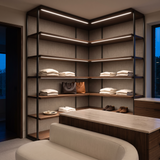 4000k white dot-free LED strip lighting beneath dark-walnut display shelves in a residential dressing room