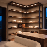 2700k white dot-free LED strip lighting beneath dark-walnut display shelves in a residential dressing room