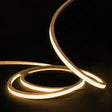 2700K warm white 10x10mm vertical bend top bend LED neon flex, 48V IP67, switched on