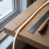 4×8mm Mini Neon Flex seated in a routed cabinet-rail groove, installation illustration