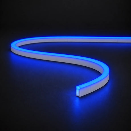 Blue 6x12mm 12V IP65 LED neon flex with a domed luminous top in an S-curve on dark charcoal.