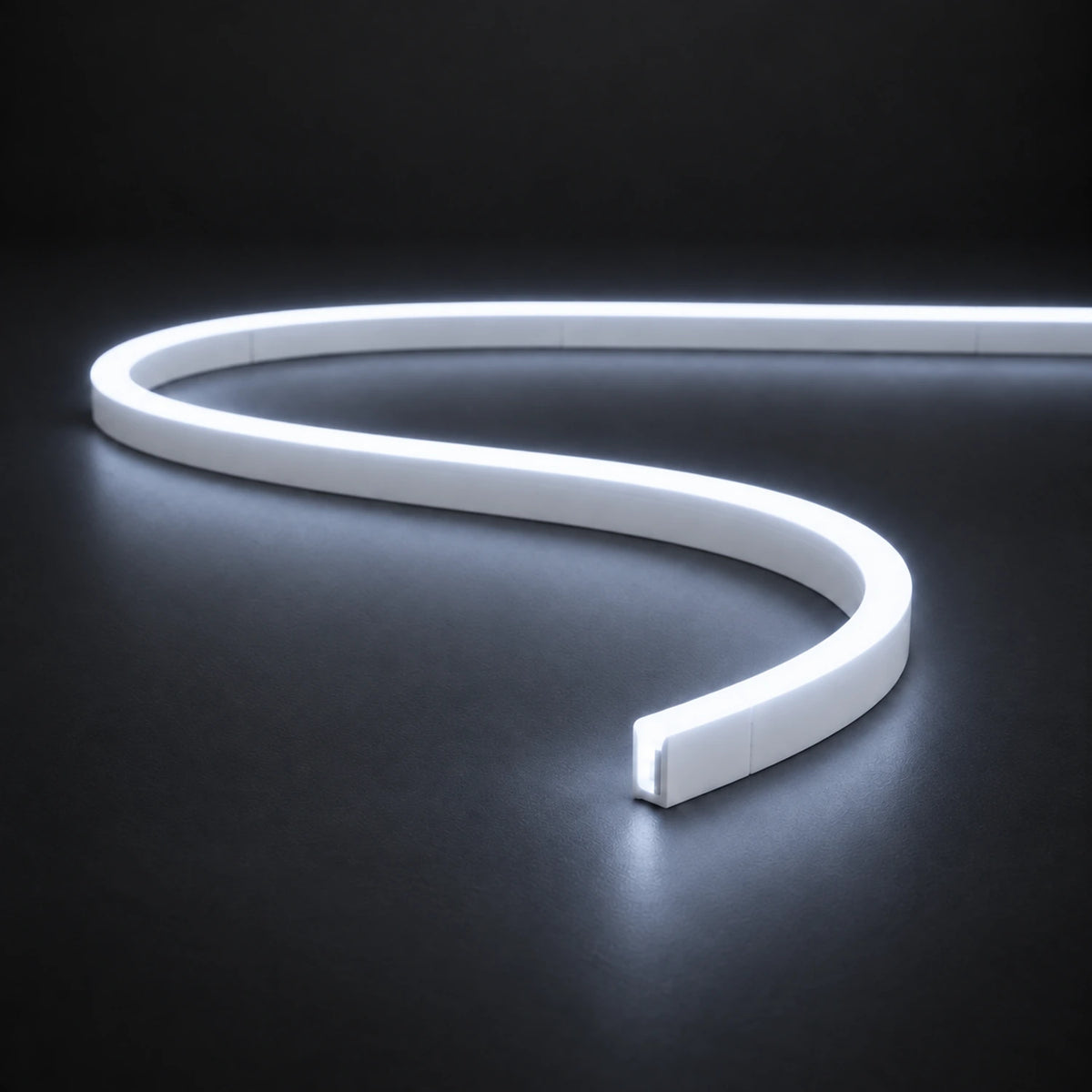 Cool White 6000K 6x12mm 12V IP65 LED neon flex with a domed luminous top in an S-curve on dark charcoal.
