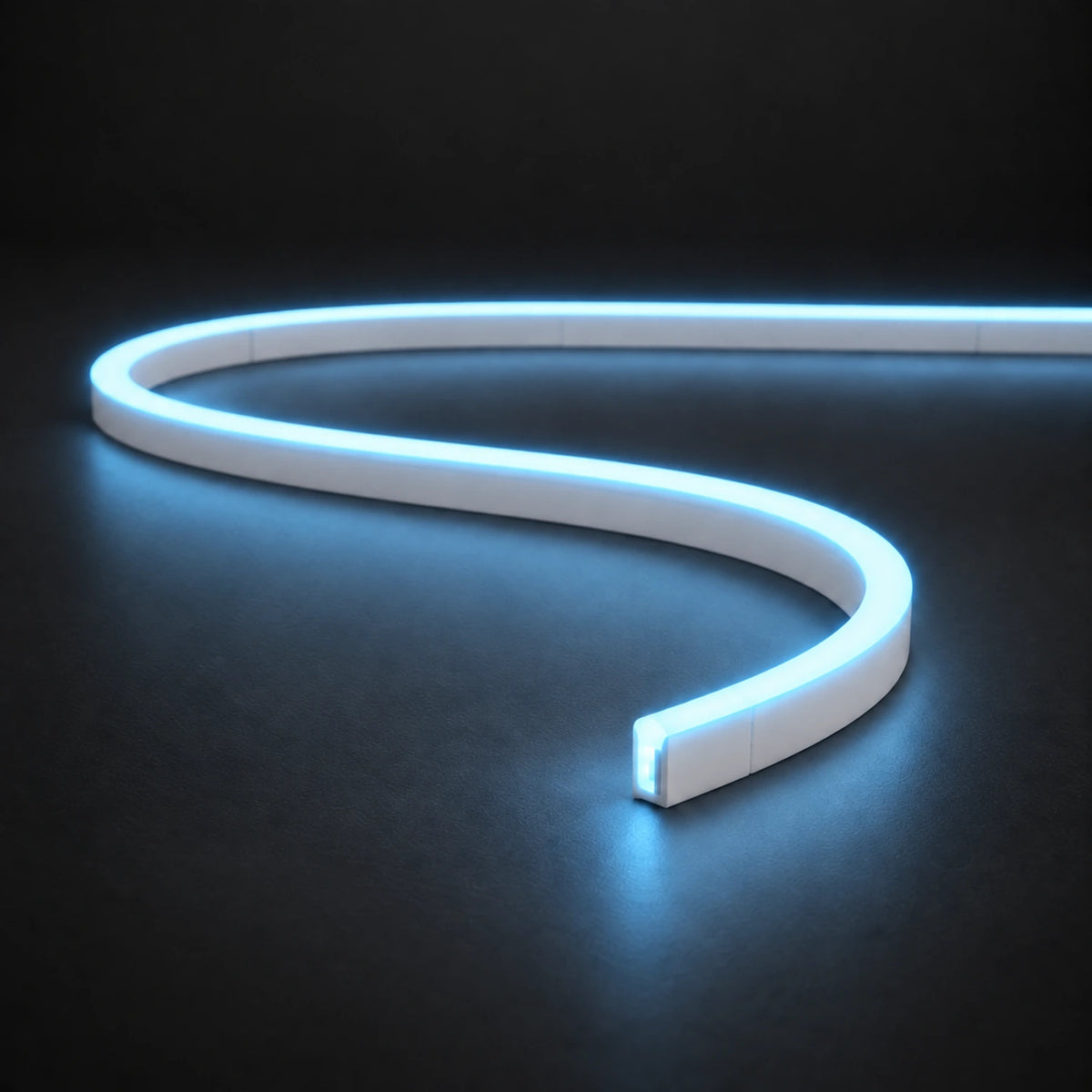 Ice Blue 6x12mm 12V IP65 LED neon flex with a domed luminous top in an S-curve on dark charcoal.