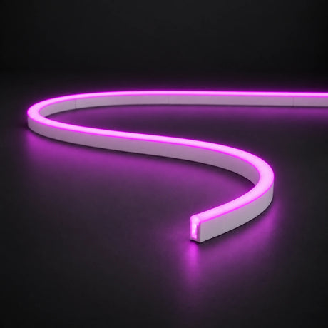Purple 6x12mm 12V IP65 LED neon flex with a domed luminous top in an S-curve on dark charcoal.