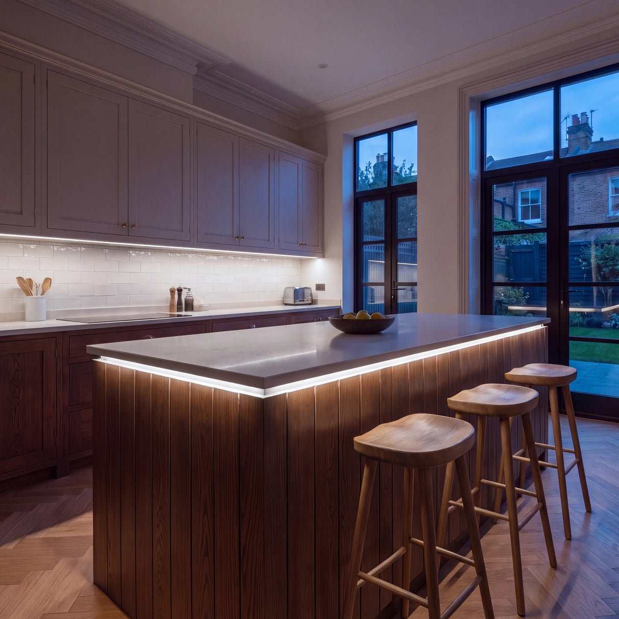 Daylight 5000K COB LED strip kitchen island lighting in a large British kitchen in the evening; installation illustration.