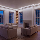 Cool White 6500K COB LED strip ceiling coving lighting in a large British living room in the evening; installation illustration.
