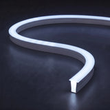 RGB neon flex showing an icy cool white RGB mix with a blue tint and matching glow on a dark charcoal surface