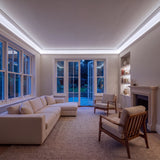 Daylight 5000K SCOB LED strip ceiling coving lighting in a large British living room in the evening; installation illustration.