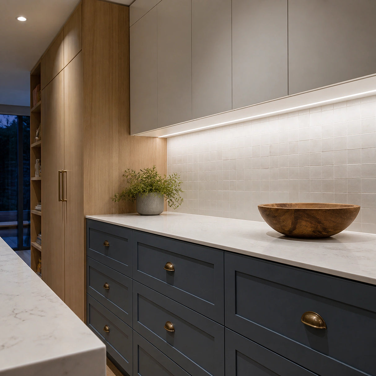 Illustrative spacious slate-and-oak kitchen with daylight-white 5000K SCOB LED lighting along a dry pantry worktop.
