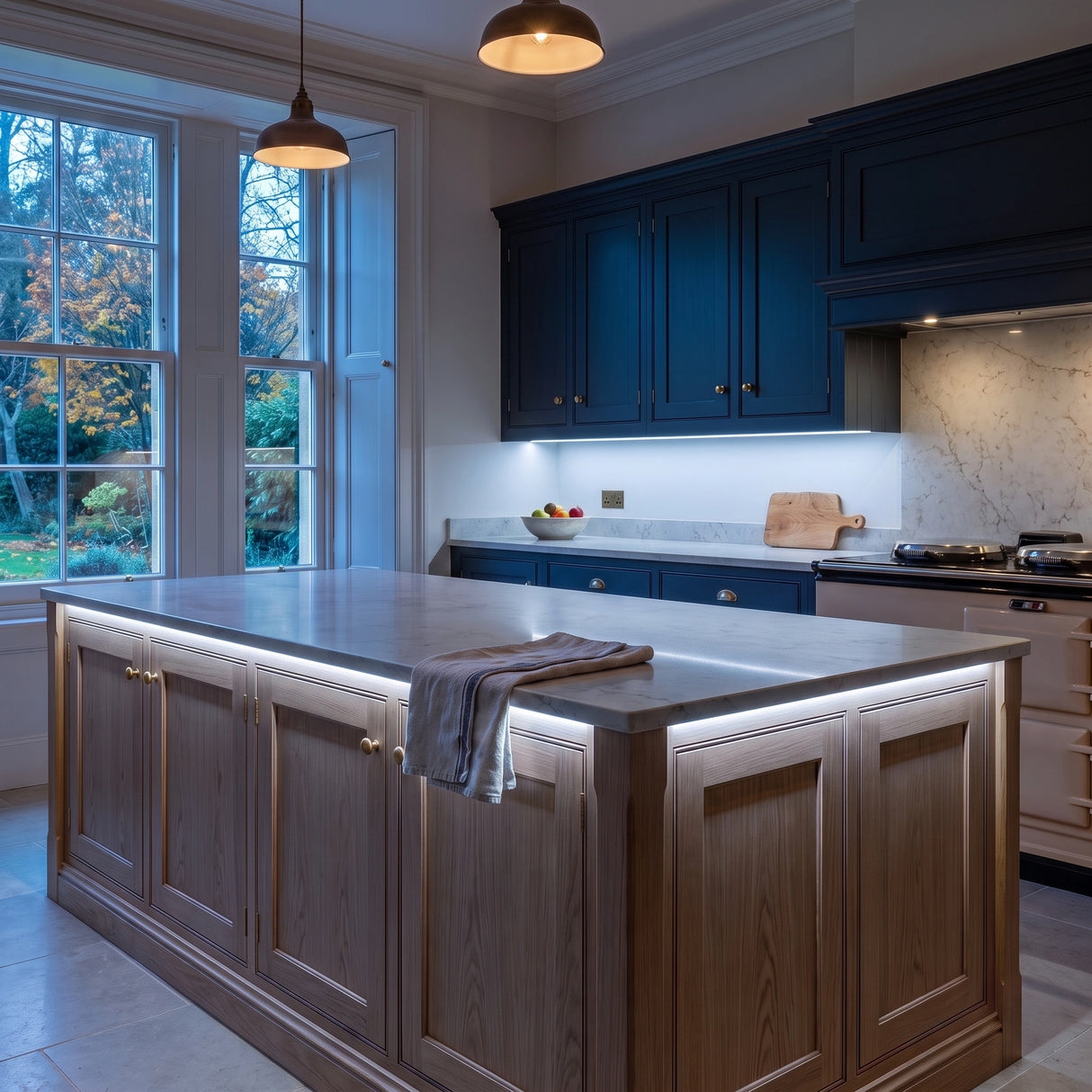 Cool White 6500K 24V 10mm COB LED strip installed beneath cabinets and around a British kitchen island; installation visual.