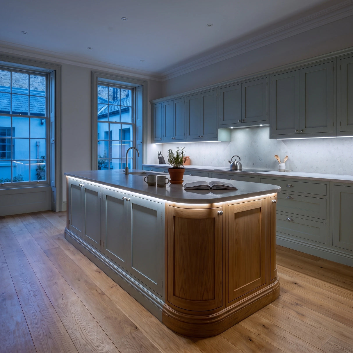 Cool White 6500K 24V 10mm COB LED strip installed beneath cabinets and around a British kitchen island; installation visual.