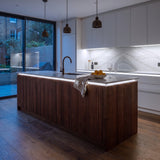 Cool White 6500K 24V 10mm SCOB LED strip installed beneath cabinets and around a British kitchen island; installation visual.
