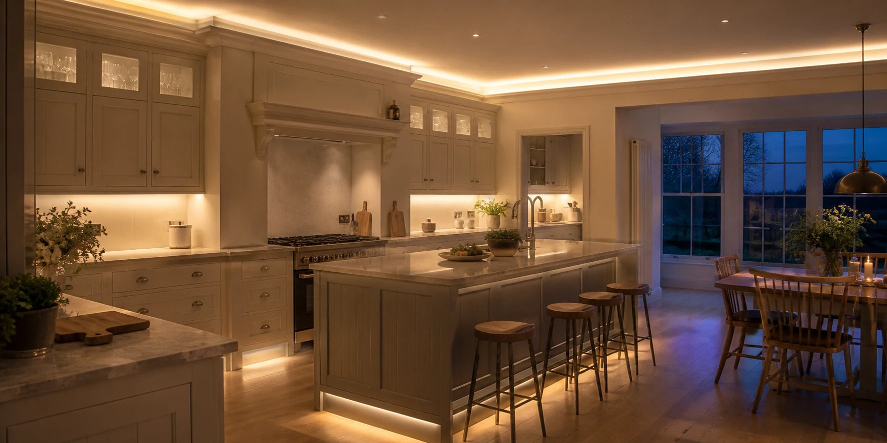 Warm white under cabinet and kitchen cabinet lights beneath wall units with island and ceiling coving lighting